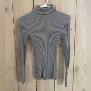 Grey ribbed turtleneck.